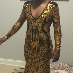 Black and gold sequin prom dress